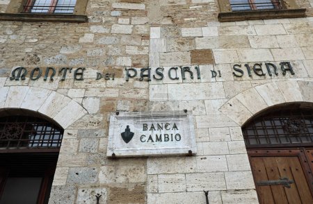 Photo for San Gimignano, SI, Italy - February 19, 2023:  Italian bank called MONTE DEI PASCHI DI SIENA without people and text BANK CHANGE - Royalty Free Image