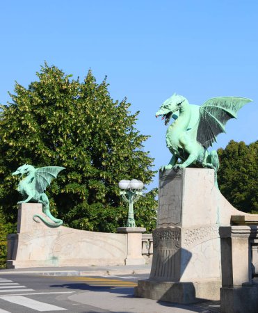 Photo for Ljubljana, L, Slovenia - August 15, 2023: great metallic dragon statues with open jaws on famous bridge called Zmajski most - Royalty Free Image