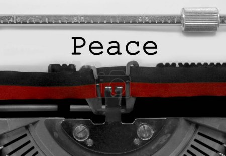 Foto de Antigua máquina de escribir con el texto paz palabra de esperanza y fin de la guerra - Imagen libre de derechos