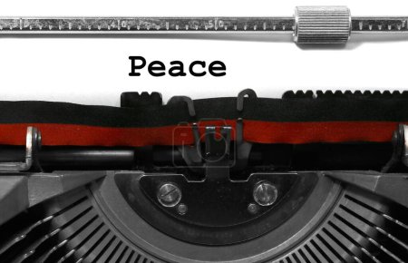 Téléchargez les photos : Détail de la machine à écrire antique avec le texte paix mot d'espoir et fin de la guerre - en image libre de droit