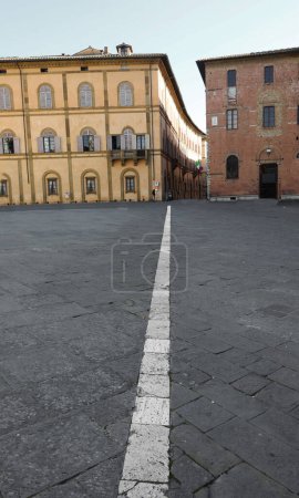 Photo for Siena Cathedral Square and the white line that once demarcated the power of the church from the power of the adjacent hospital building - Royalty Free Image