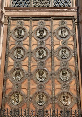 Photo for Budapest, B, Hungary - August 19, 2023: wooden gate with faces at St Stephen s Basilica in Budapest  Hungary - Royalty Free Image