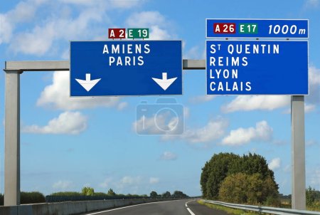 Photo for Large road sign with the French locations to reach the city of Paris or Amiens and other places - Royalty Free Image
