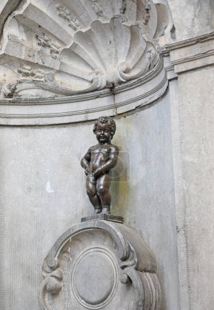 Photo for Brussels, B, Belgium - August 18, 2022: famous fountain called Manneken Pis with a little statue of a boy while pissing - Royalty Free Image