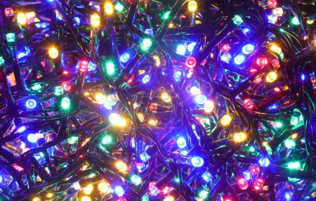 background of series of illuminated LED lights for decorations during the holidays ideal as a bright fun background for celebrations