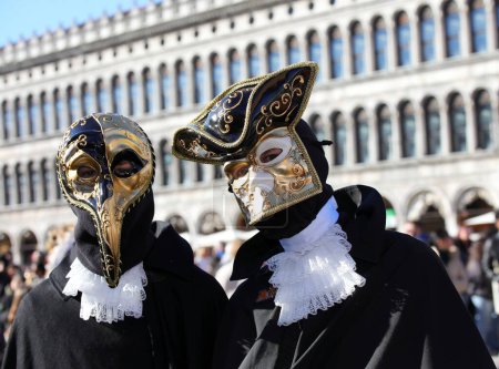 Photo for Venice, VE, Italy - February 13, 2024: people with ancient Venetian costumes during the carnival in Piazza San Marco - Royalty Free Image