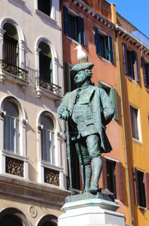 Photo for Venice, VE, Italy - February 13, 2024: statue of the famous Venetian writer CARLO GOLDONI with a seagull on head - Royalty Free Image