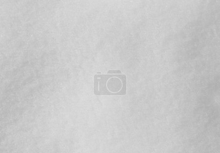white background of freshly fallen snow crystals in cold winter