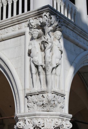 Photo for Venice, VE, Italy - February 13, 2024: Corner relief od staues of Adam and Eve in Ducal Palace - Royalty Free Image