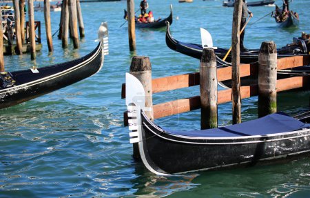 characteristic metal prows of traditional Venetian boats called GONDOLAS