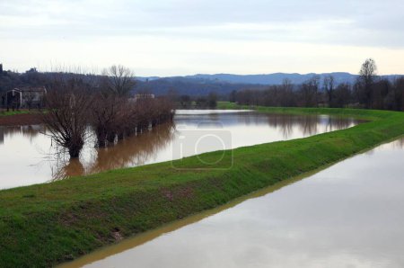 Completely flooded fields after the river overflowed due to climate change