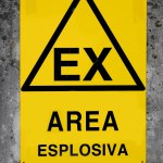 Sign in the fence of the reserved area at risk of explosion due to flammable substances and the text in Italian meaning EX Explosive Area