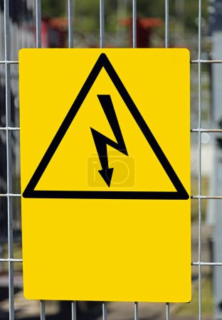 Danger high voltage risk of death sign  with lightning bolt in yellow triangle without text