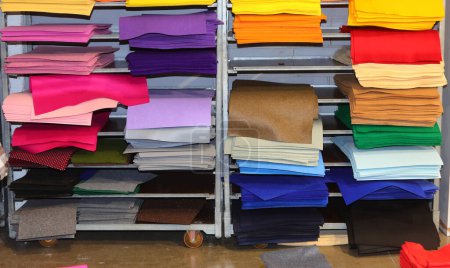 Photo for Many colorful pieces of felt fabric for sale on shelf in hobby supplies store - Royalty Free Image