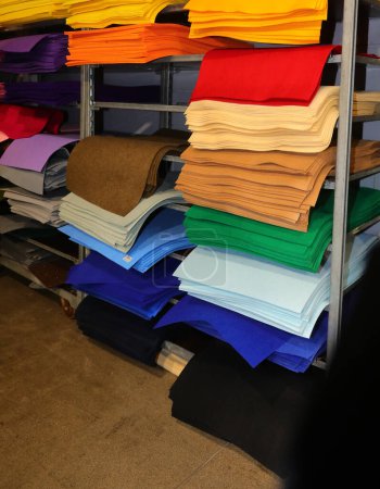 Photo for Colorful pieces of felt fabric for sale on shelf in hobby supplies store - Royalty Free Image