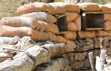 many Sandbags of a trench dug in the ground to defend army soldiers from enemy raids and explosions