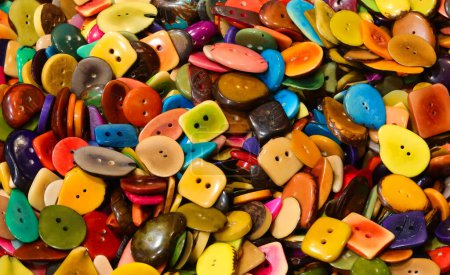 many colored buttons created from the seed of the Tagua plant also known as vegetable ivory and therefore eco-sustainable