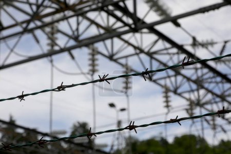 barbed wire of the protected industrial area without people without people