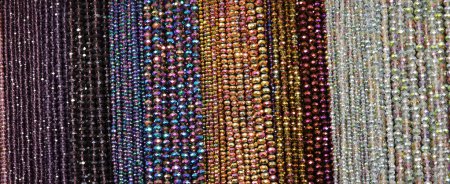many columns with silver golden indigo blue beads and various colorful shades for sale in fashion accessories shop