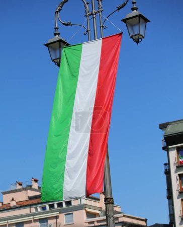 Giant flag with color GREEN WHITE AND RED in the city