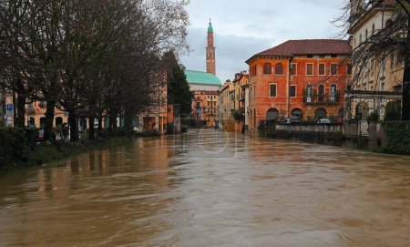 River overflowed during a city flood with  muddy water in VICENZA CITY In Northern italy