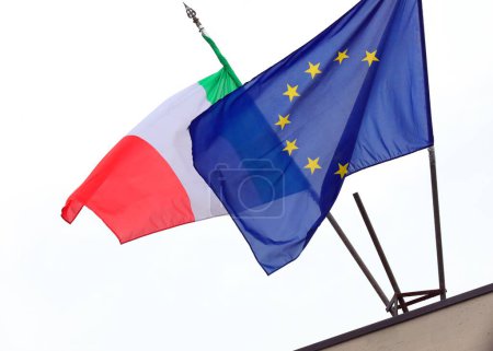 Italian and European Union flags waving against white background