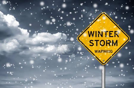 Téléchargez les photos : Winter Storm warning - road sign information - en image libre de droit
