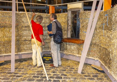 Photo for Paris, France, Salesman, Ecologic Insulation Trade Show, Straw - Royalty Free Image