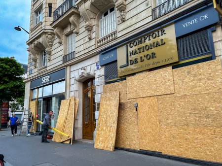 Photo for Paris, France, Workers Installing Protection on Shop WIndows, Place de la Nation, in Preparation of a large Anti-Government Demonstration, - Royalty Free Image