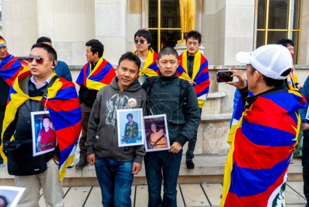 Photo for Paris, France, Large Group People, Tibetans, Holding Protest Signs, Photos of Dead Monks, Protesting Against Chinese Government, Visit of Chinese President Xi , 2014 - Royalty Free Image