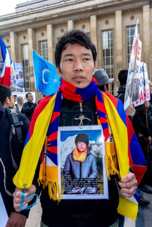 Photo for Paris, France, Tibetan Man Holding Photo of Dead Monk, TIbetans, Protesting Against Chinese Government, Visit of Chinese President Xi , 2014 - Royalty Free Image