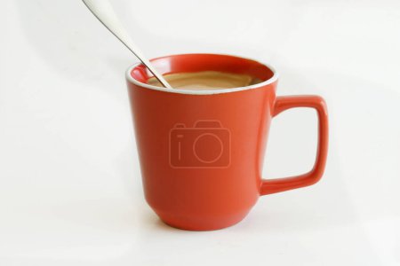 Photo for Red cup of coffee with one drop against a white background - Royalty Free Image