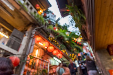Téléchargez les photos : Résumé, Jiufen Old Street est une ruelle étroite et sinueuse avec boutiques, salons de thé et restaurants qui offre aux touristes une vue sur la vie traditionnelle taïwanaise. - en image libre de droit