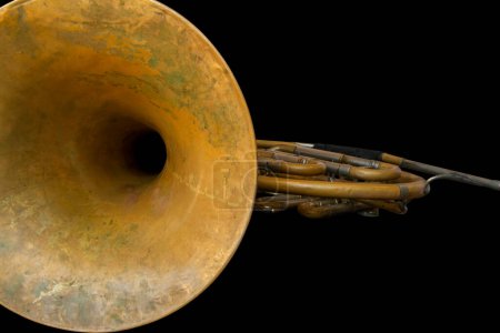 Photo for Close-up view of old vintage French horn isolated on a black background with clipping path. Music instruments series - Royalty Free Image