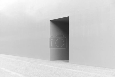 Photo for Sparse monochrome image with doorway in wall - Royalty Free Image