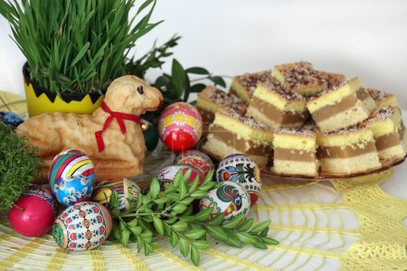 celebration Traditional Easter  Holidays with Lamb,food,green plants and Easter eggs   