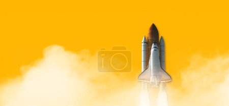 Téléchargez les photos : Space Shuttle isolated on yellow background. Elements of this image furnished by NASA. - en image libre de droit