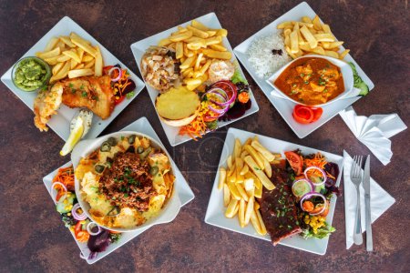 A variety of Asiatic European and American dishes. Top view. Flat lay. High quality photo