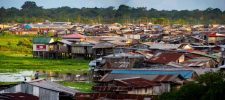 Photo for Iquitos, Peru - Apr, 2022:  Floating shantytown of Beln consisting of scores of huts  built on rafts which rise and fall with the river. Latin America - Royalty Free Image