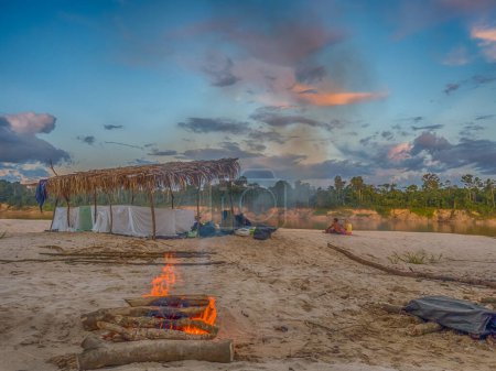 Photo for Tabatinga, Brazil - September 15, 2018: Camp on the sandy beach in Amazon jungle, during the low water season. Amazonia. Selva on the border of Brazil and Peru. South America. Dos Fronteras. - Royalty Free Image