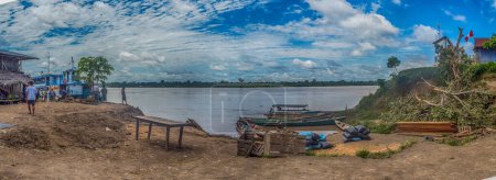Photo for Amazon River, Peru - December 04 , 2018:  Panoramic view of village on the bank of the Amazon River. South America. - Royalty Free Image