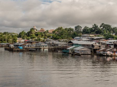 Photo for Pebas, Peru - May 13, 2016:  Small village on the bank of the Amazon River. Amazonia. South America. 'Tierra de Amor' - Land of love - Royalty Free Image