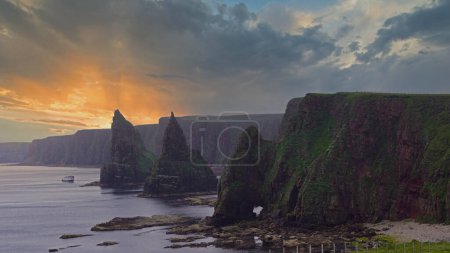 Photo for Duncansby Head is the northeastern tip of Scotland, close to the village of John o Groats.  Duncansby Head is particularly spectacular because of the rock needles, the so called Duncansby Stacks. - Royalty Free Image