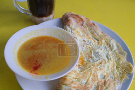 Téléchargez les photos : Roti canai ou Roti Parata boisson très célèbre et de la nourriture en Malaisie - en image libre de droit