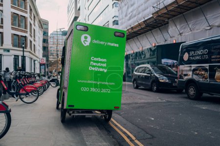 Photo for London, UK - February 02, 2023: Delivery Mates van parked on a street in the City of London. Delivery Mates is a last-mile delivery company offering sustainable carbon neutral delivery. - Royalty Free Image