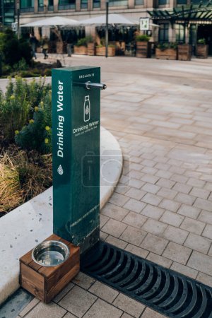 Photo for London, UK - February 02, 2023: Water refill station at Broadgate Exchange Square, a green space at Broadgate with aim to boost the emotional and physical wellbeing of those that work in the area. - Royalty Free Image