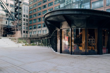 Photo for London, UK - February 02, 2023: Back to Mine restaurant at Broadgate Exchange Square, a green space at Broadgate with aim to boost the emotional and physical wellbeing of those that work in the area. - Royalty Free Image