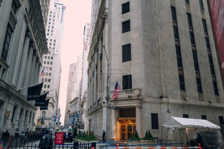 Photo for New York, USA - November 25, 2022: Wall Street entrance to The New York Stock Exchange, an American stock exchange in the Financial District of Lower Manhattan in New York City. - Royalty Free Image