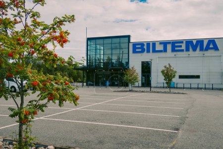 Photo for Helsinki, Finland - August 22, 2022: BILTEMA store. Blue sign above main entrance to building. Car parking in front exterior facade of store - Royalty Free Image
