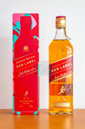Photo for Pruszcz Gdanski - December 24, 2023: Box and bottle of scotch whisky Johnnie Walker Red Label. - Royalty Free Image